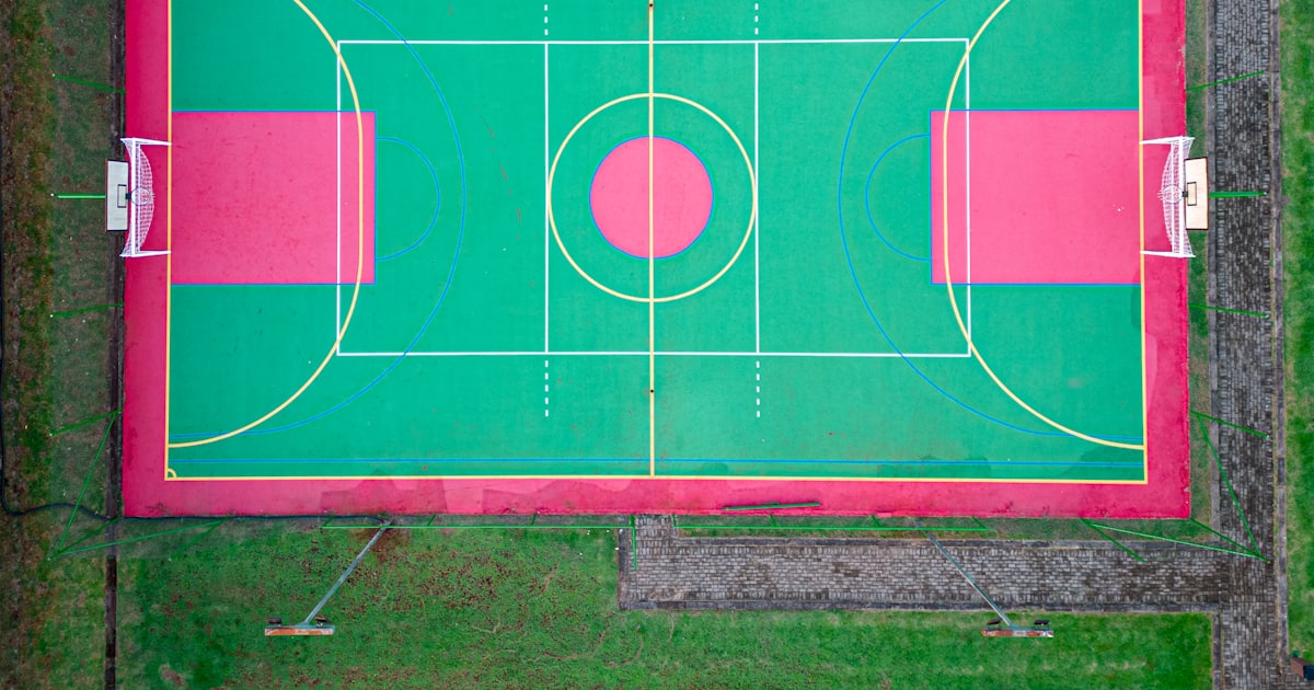 an overhead view of a basketball court in a park