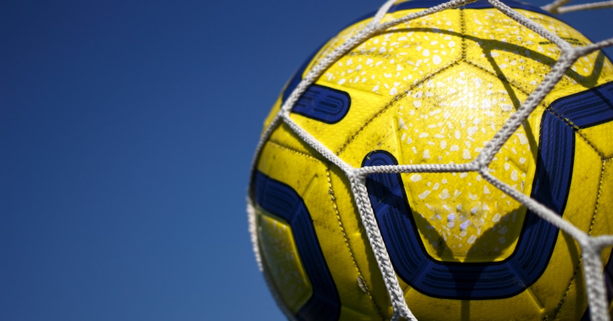 yellow and black soccer ball