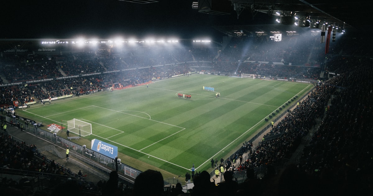 a soccer stadium filled with lots of people