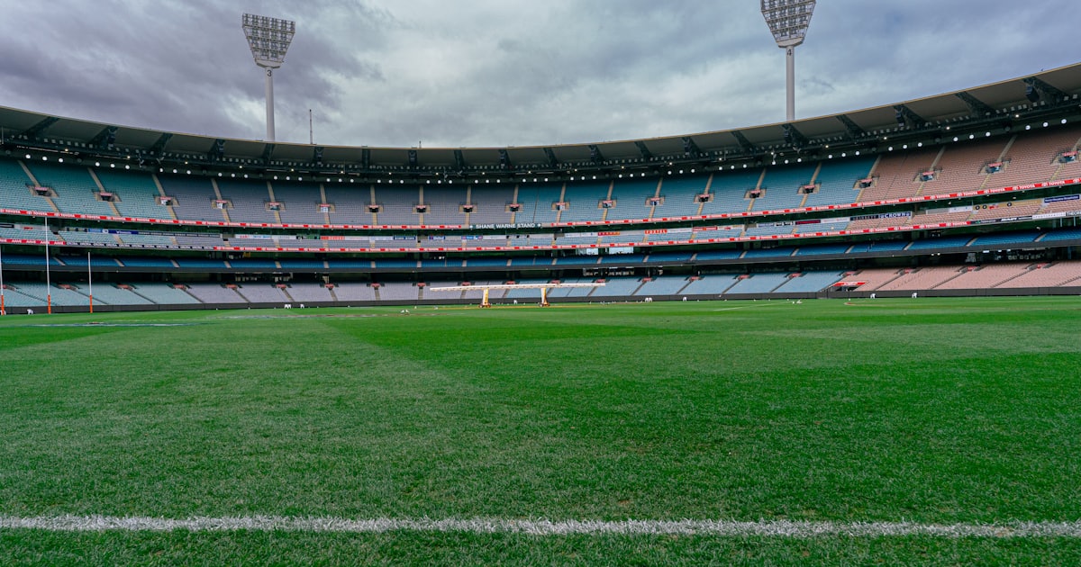 a sports stadium with a field