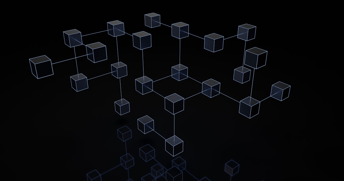 a black and white photo of cubes on a black background